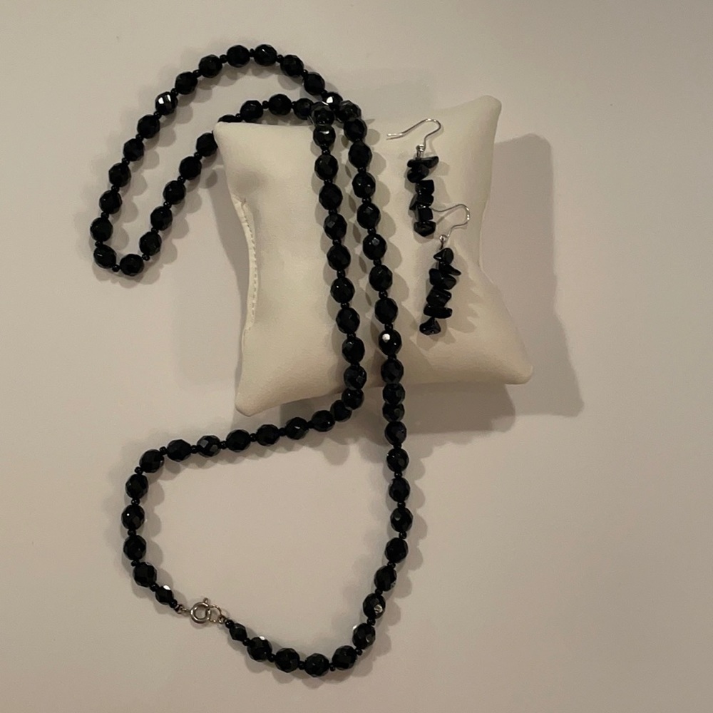 Black beaded necklace with earrings.